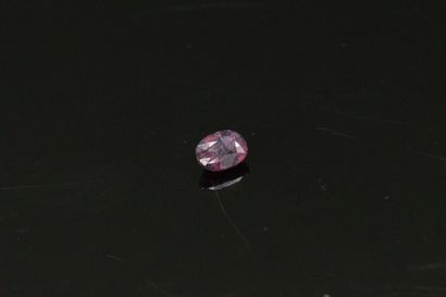 null Pink sapphire oval on paper.

Weight : 0.49 cts.