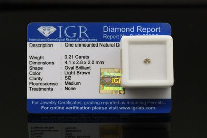 null Light brown" oval diamond under seal.

Accompanied by a certificate of the IGR...
