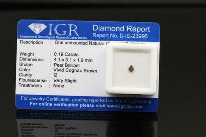 null Vivid cognac brown" pear diamond under seal.

Accompanied by a certificate of...