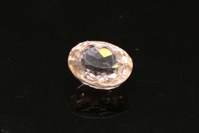 null Oval tourmaline on paper. 

Weight : 1.75 cts.