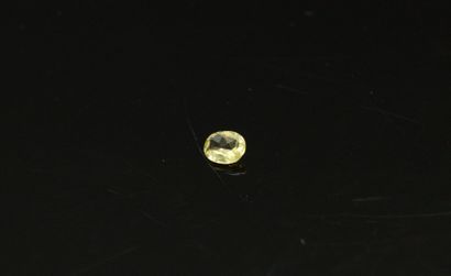 null Oval citrine on paper. 

Weight : approx. 0.50 cts.
