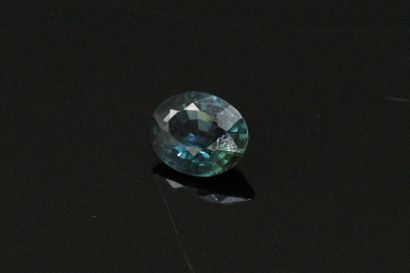 null Oval sapphire on paper. 

Weight : 0.68 cts.