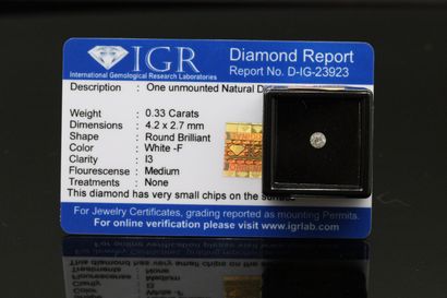 null White F" round diamond.

Accompanied by a certificate of the IGR indicating...