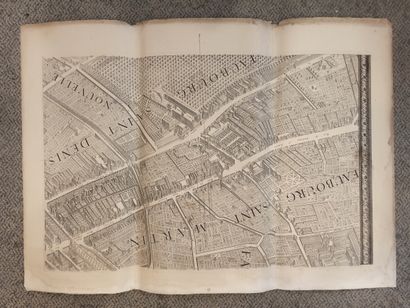 null 
Important map of the city of Paris divided into 13 plates.

Dim. of the plates:...