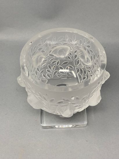 null LALIQUE France

Cup on pedestal partly frosted with decoration in relief of...