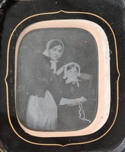 null 
Portrait of two young women. Circa 1860. Retouched Ambrotype (att.). On the...
