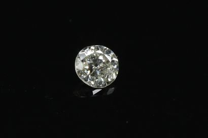 null Round diamond on paper.

Weight : 0.14 ct.