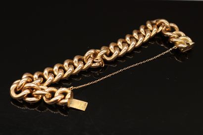 null Bracelet en or jaune 18k (750) avec chainette de sécurité. 

Poids : 17.41 g....
