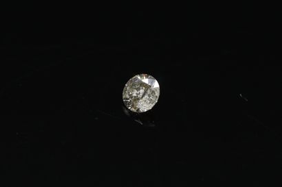 Diamant rond sur papier.

Poids : 0.28 c...