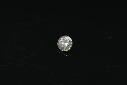 Diamant rond sur papier.

Poids : 0.18 c...