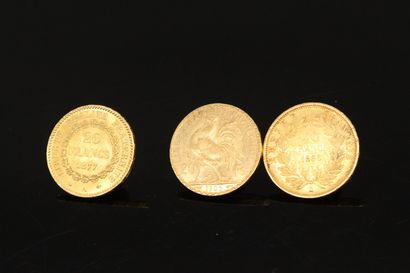 null Trois pièces en or de 20 francs :

- Napoléon tête nue 1860 A (atelier : Paris)

-...