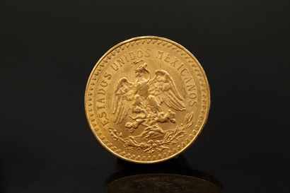 Gold coin of 50 pesos

Weight : 61.43 g.