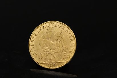 null Gold coin of 10 Francs with rooster (1901)

Weight : 3.22 g.