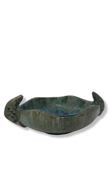 null French work - XXth century

Oblong-shaped bowl in stoneware with blue glaze,...