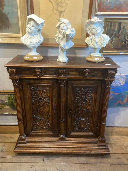 null Renaissance style furniture opening with two doors and two drawers. Carved with...