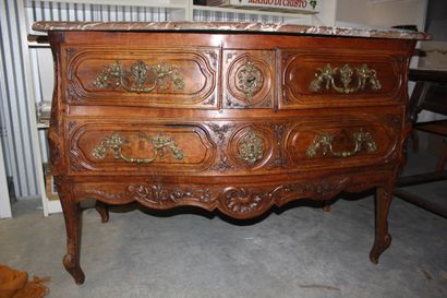 null Chest of drawers in carved and molded natural wood decorated with garlands of...