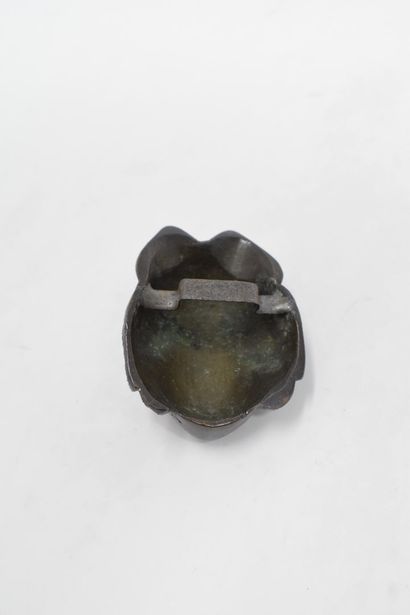 null CHINA and ITALY, 20th century

Two small bronze masks; one showing a young woman's...