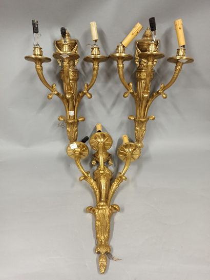 null Three bronze sconces in the Louis XVI style