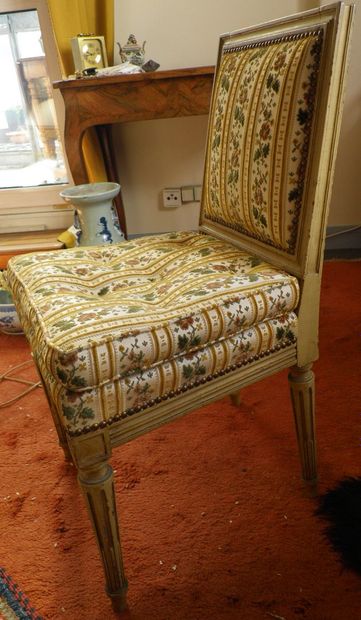 null An armchair and a chair in the Louis XVI style upholstered in fabric with bands...