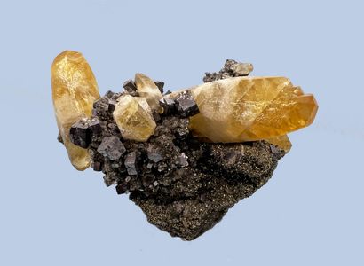 null Calcite, pyrite, galena, quartz: honey-terminated milky yellow calcite crystals...