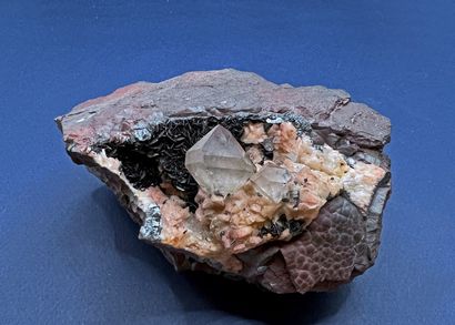 null Classic hematite, goethite, quartz: shiny black millimeter lamellae of hematite;...