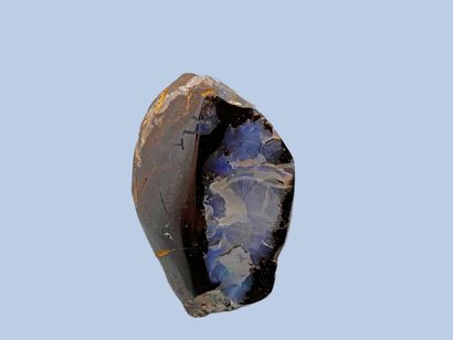null Precious black opal: colors: dark blue (dominant) and light, green - black body

Tasmania,...