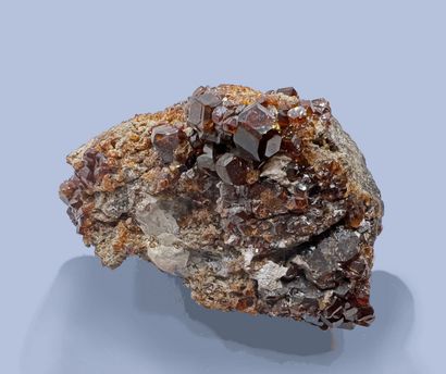 null Spessartine garnet : beautiful orange-brown gemstone dodecahedra on a gangue...