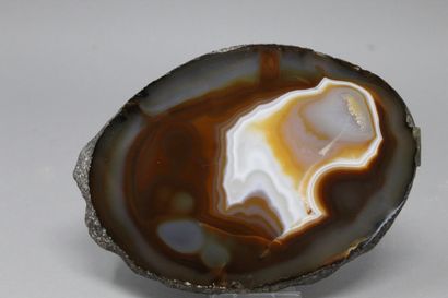 null Agate: brown, beige / yellow, light gray, polished face 

Probably Brazil (1978)...