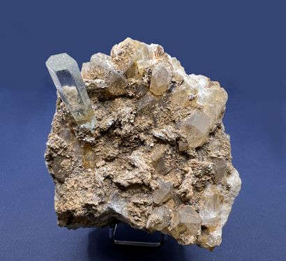 null Aquamarine, quartz: almost perfect clear hexagonal crystal (45 mm) on 

gangue...