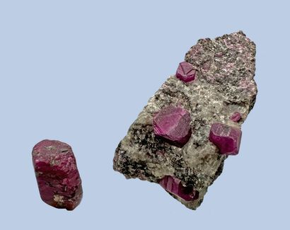 null Rubies: four red hexagonal premiums (up to 8 mm) on gangue. A free hexagonal...