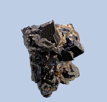 null Lazulite: aggregate of iridescent dark blue crystals up to 15 mm. Difficult...