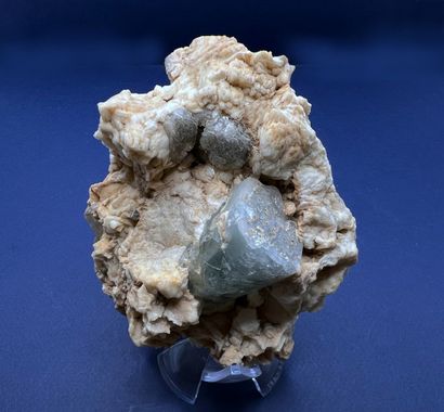 null Beryl, cleavelandite, pyrite: opaque blue hexagonal crystals (main 4 cm), 

on...