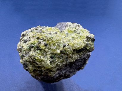 Peridot, olivine: green translucent crystals...