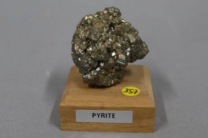 Small pyrite on wood base 

Peru 

Dimensions...