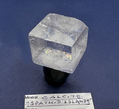 null Calcite var. spath : small gem cleaved rhombohedron 

Icelander ? 

Dimensions...