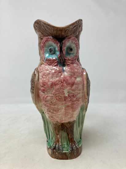 null Pitcher in barbotine with owl.

H. 25.5cm