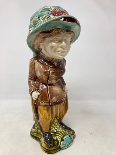null Onnaing 

Pitcher Skirt with green hat. 

H. 32cm