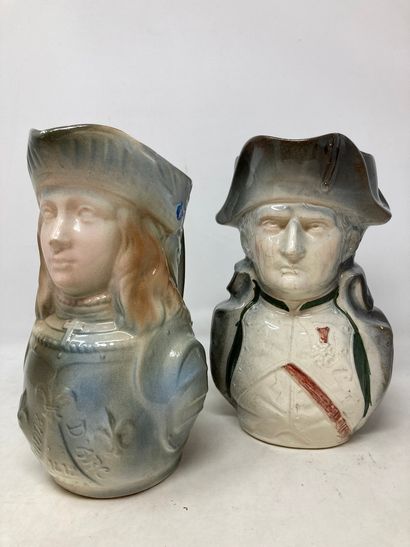 null Lot of two barbotine pitchers representing Napoleon and Joan of Arc. 

H. 22cm...
