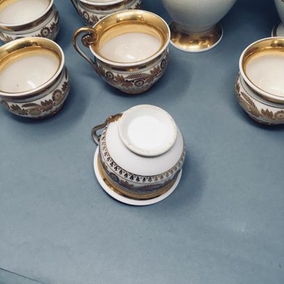 null OLD PARIS 

Part of coffee service in white porcelain enhanced with gold and...