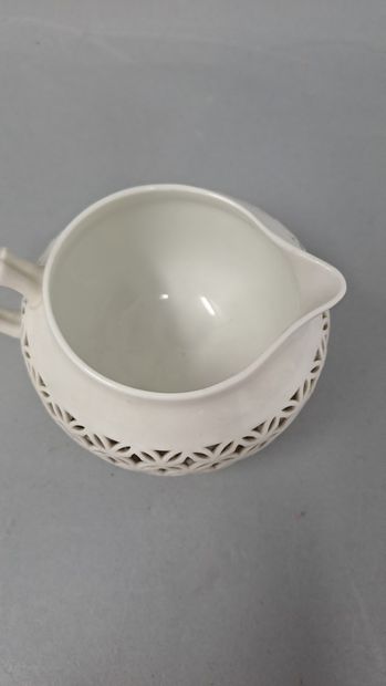 null SEVRES 

Part of service to tea and coffee in white porcelain reticulated whose...