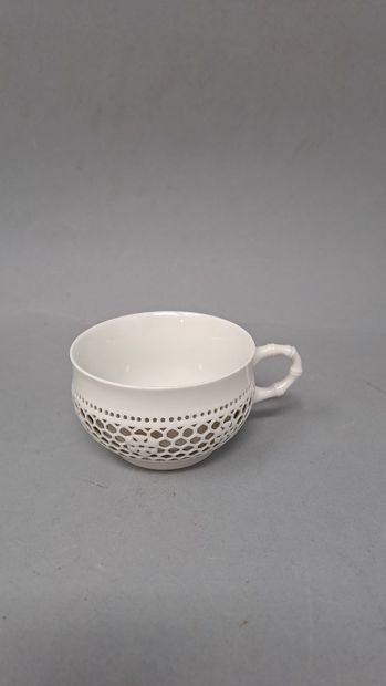 null SEVRES 

Part of coffee service in white reticulated porcelain, Chinese model,...