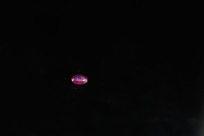 null Oval ruby on paper. 

Weight : 0.59 ct



Size : 6.5 mm x 5 mm
