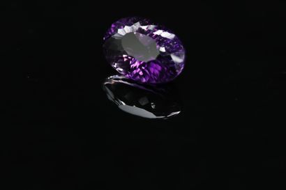 null Amethyst oval concave on paper. 

Weight : 16.58 cts.