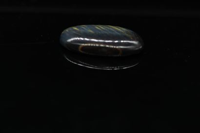 null Oval tiger eye cabochon on paper. 

Weight : 21.23 cts. 



Dimensions : 27.5...