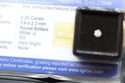 null White J" round diamond under seal. 

Accompanied by a report from the IGR attesting:...