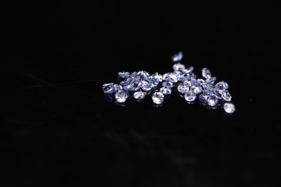 null Lot of forty-five round tanzanites on paper. 

Total weight : 4.99 cts. 



Average...