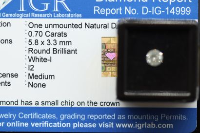 null Diamant "White I" rond sous scellée. 

Accompagné d'un rapport de l'IGR attestant...