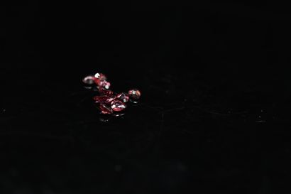 Lot of ten pear rubies on paper. 

Weight...