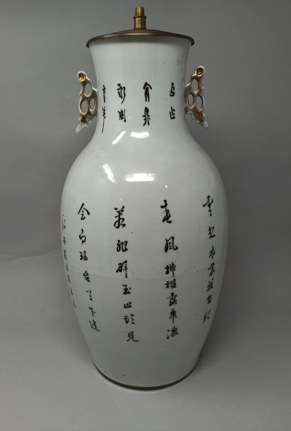 null CHINA, 20th century

Porcelain vase decorated on one side with calligraphy and...