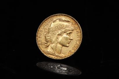 Pièce en or de 20 francs Coq (1910).

TTB...